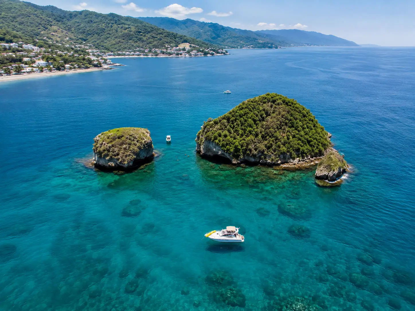 Los Arcos Marine Park Cruise to the iconic rock arches and anchor for snorkeling in clear water with tropical fish. Gear is provided for everyone on board.