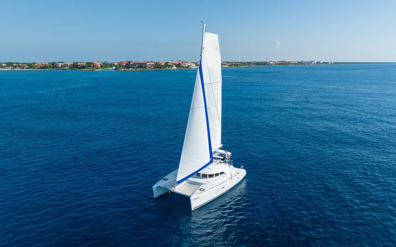 Boarding at Puerto Aventuras Marina Meet crew, safety briefing, welcome drink as we set sail