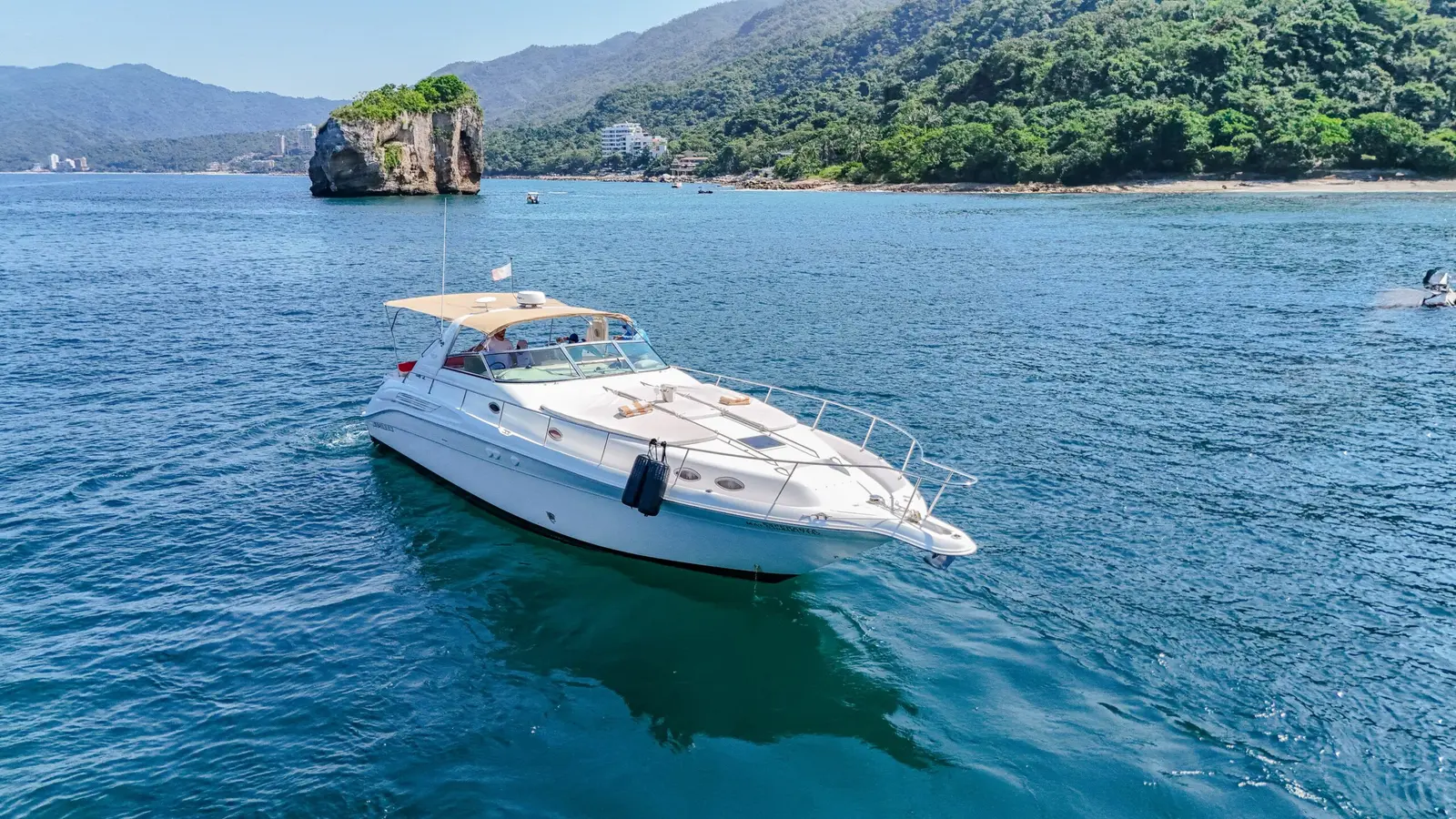 Los Arcos Marine Park Cruise to the iconic rock arches and anchor for snorkeling in clear water with tropical fish. Gear is provided for everyone on board.