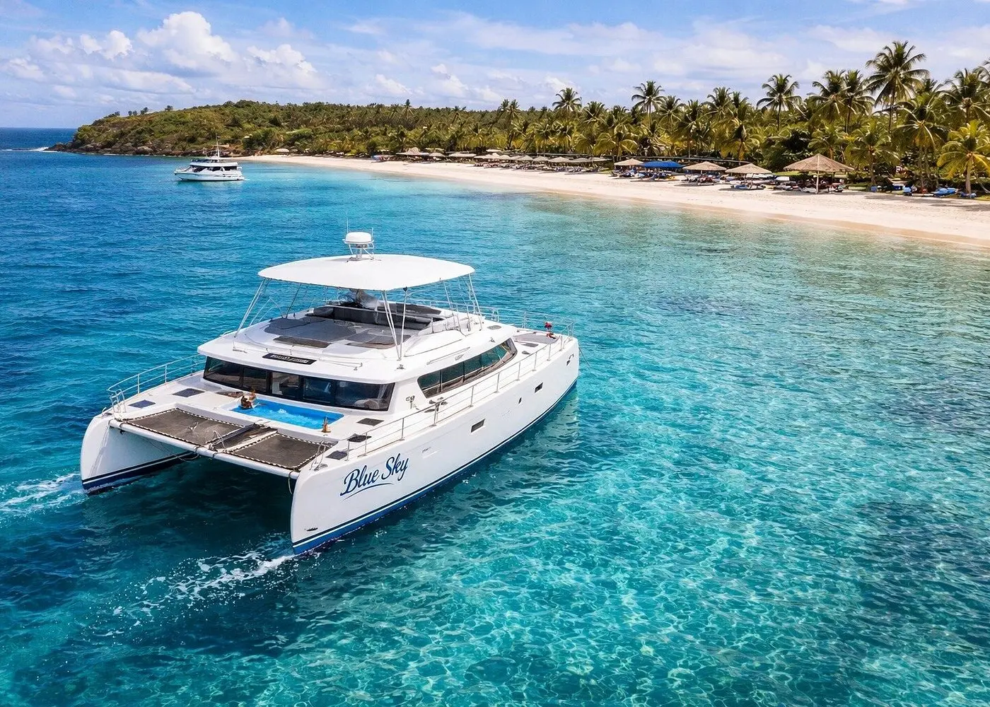 Board the Blue Sky Catamaran at Sosúa Beach  Welcome onboard, safety briefing, first drinks served