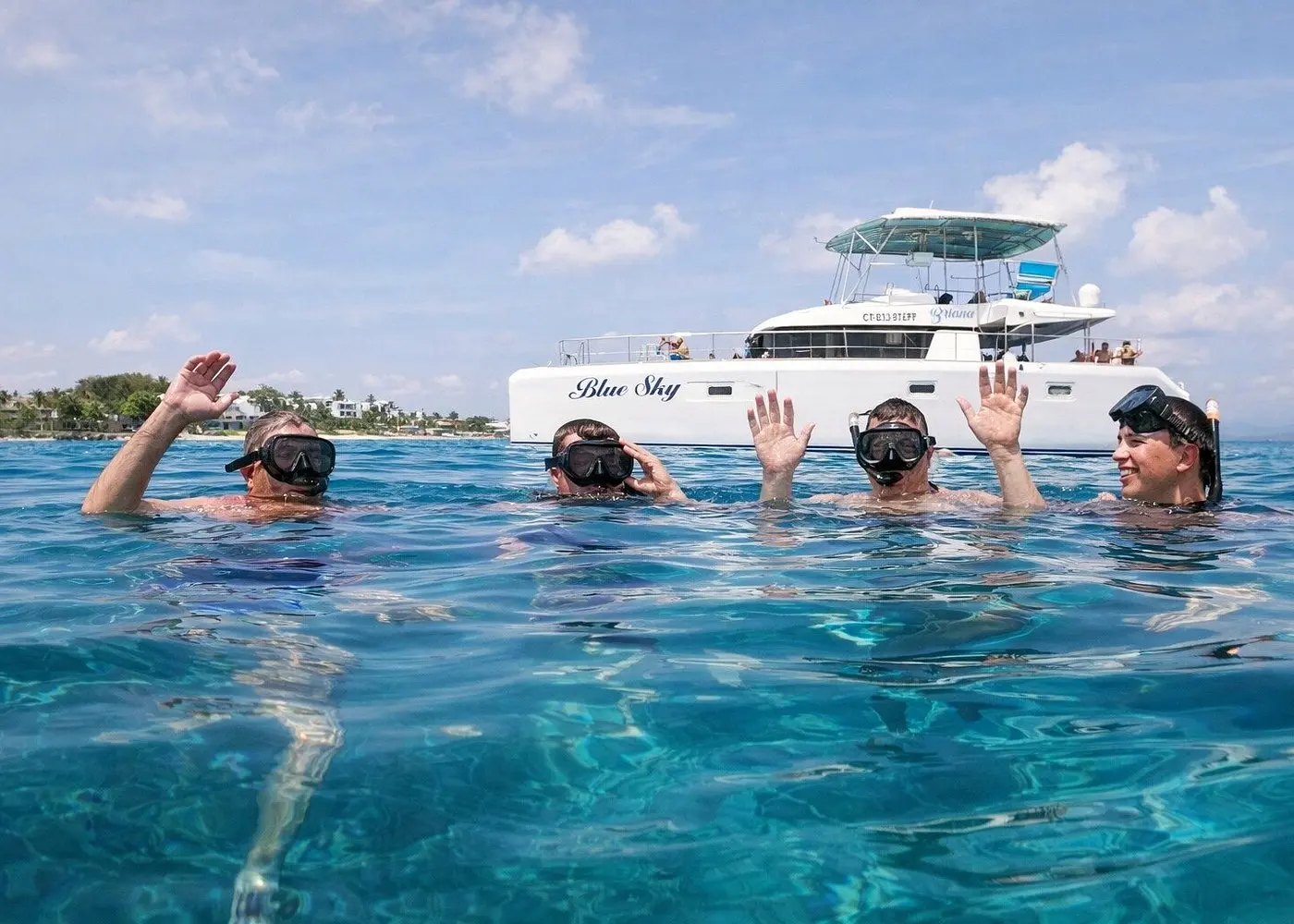 First Snorkel Stop  Anchor at the first reef location — full gear provided