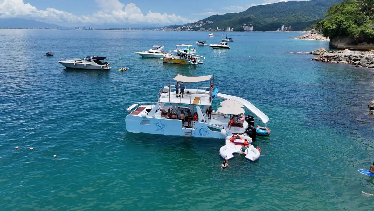 Los Arcos Marine Park Cruise to the iconic rock arches and anchor for snorkeling in clear water with tropical fish. Gear is provided for everyone on board.